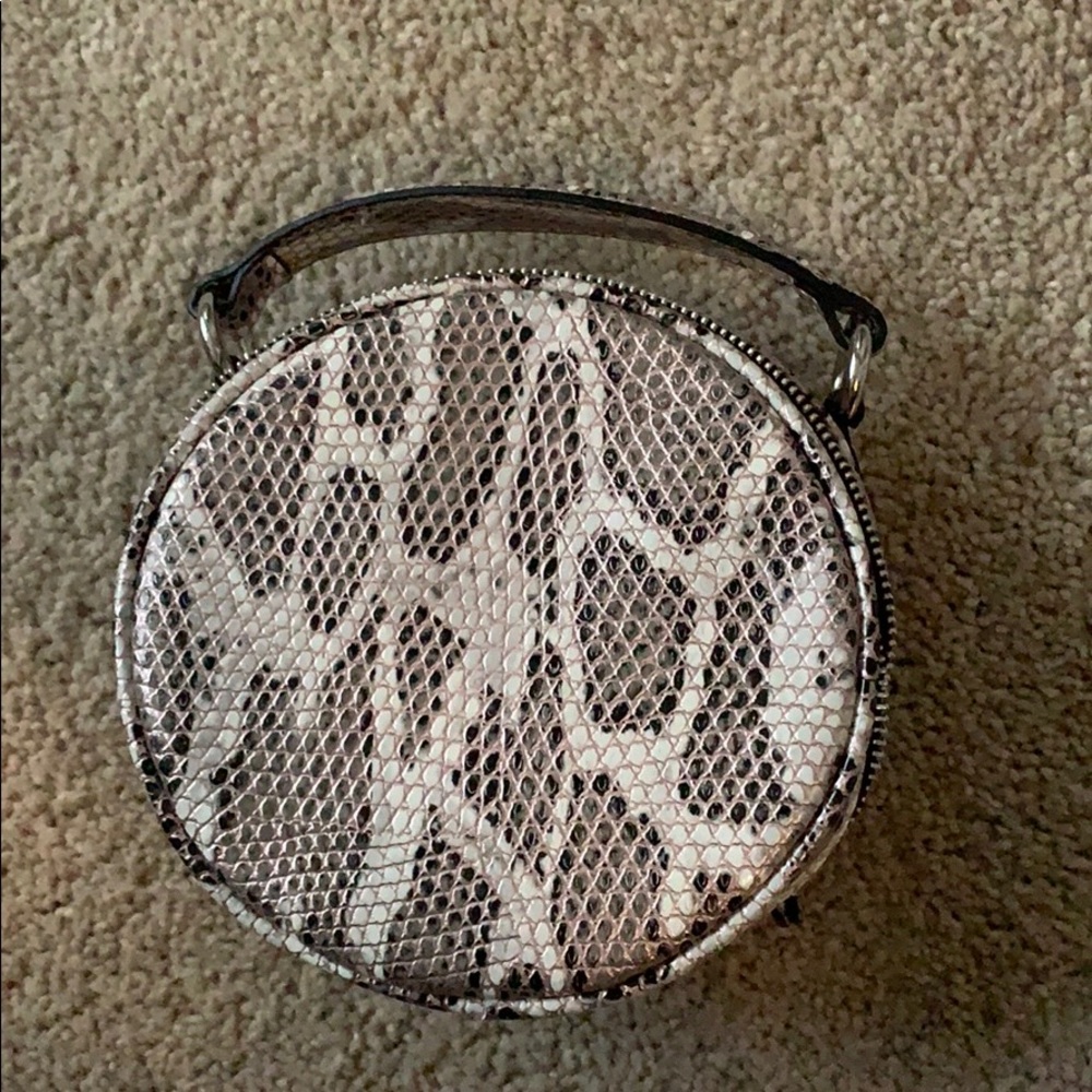 Snakeskin circular bag